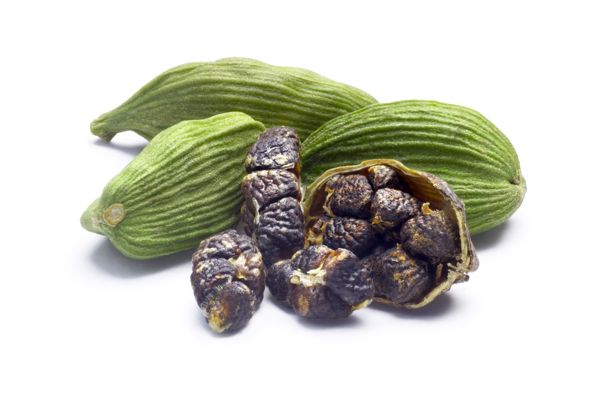 Dried green cardamom pods and seeds, paths